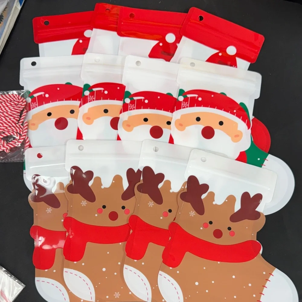 Festive Santa, Snowman and Reindeer Party Bags 12 pieces 4 of each kind & string